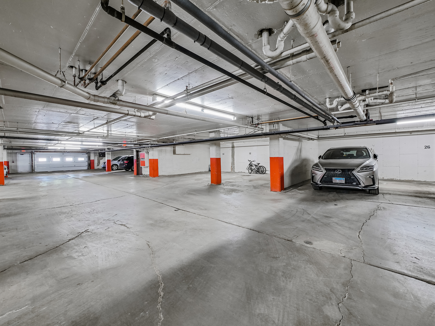 1747 West Crystal Lane, Unit 210 Mount Prospect, IL 60056 - Photo 27 of 33 a view of parking garage with cars