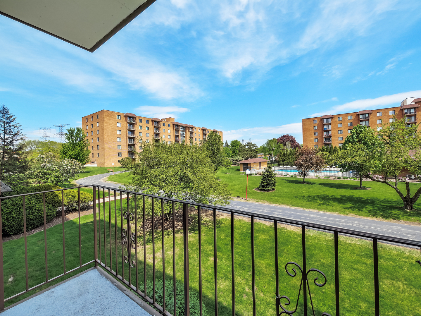 1747 West Crystal Lane, Unit 210 Mount Prospect, IL 60056 - Photo 8 of 33 a view of a city skyline from a balcony
