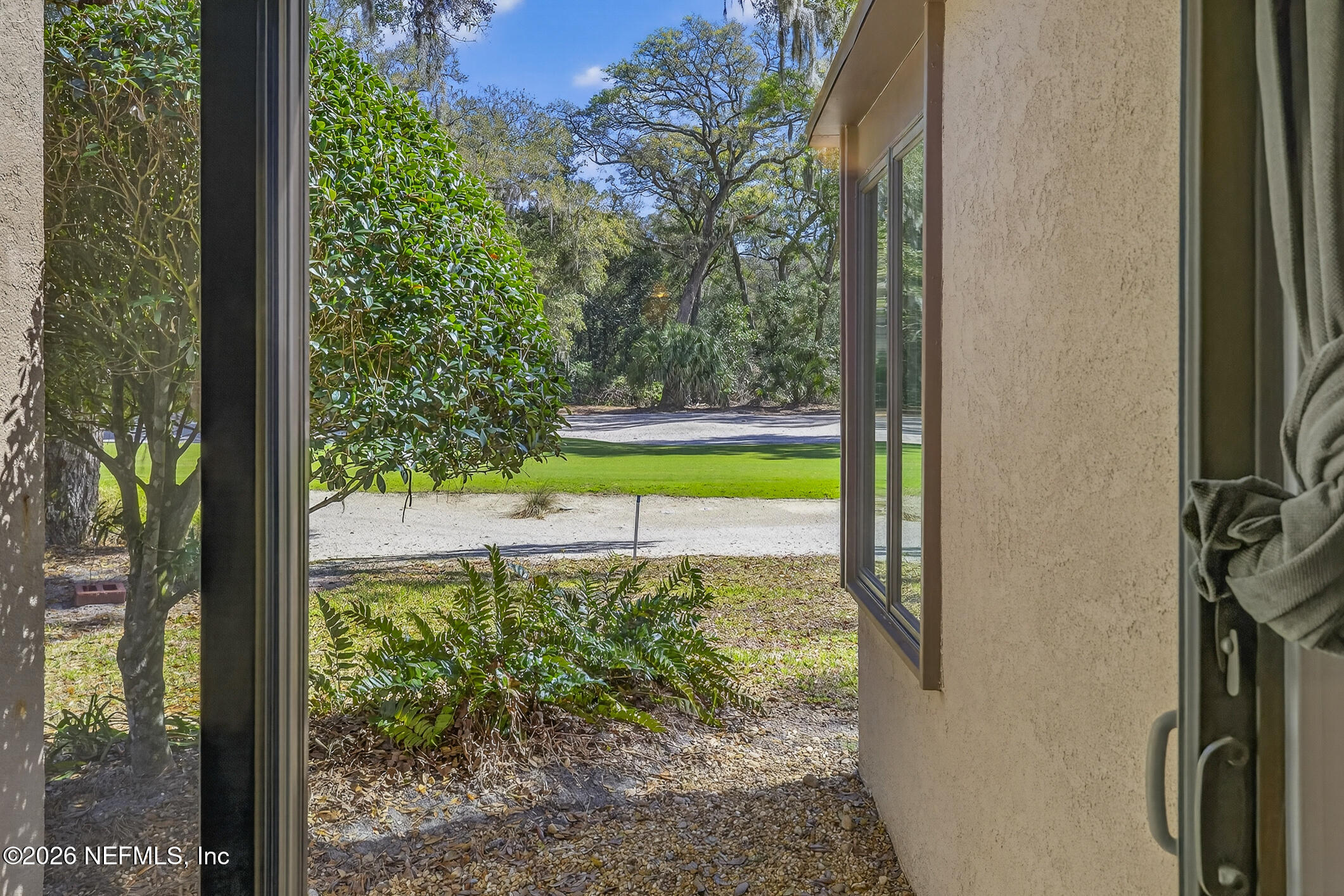 3301 Sea Marsh Road Fernandina Beach, FL 32034 - Photo 22 of 41 a view of a swimming pool from a window