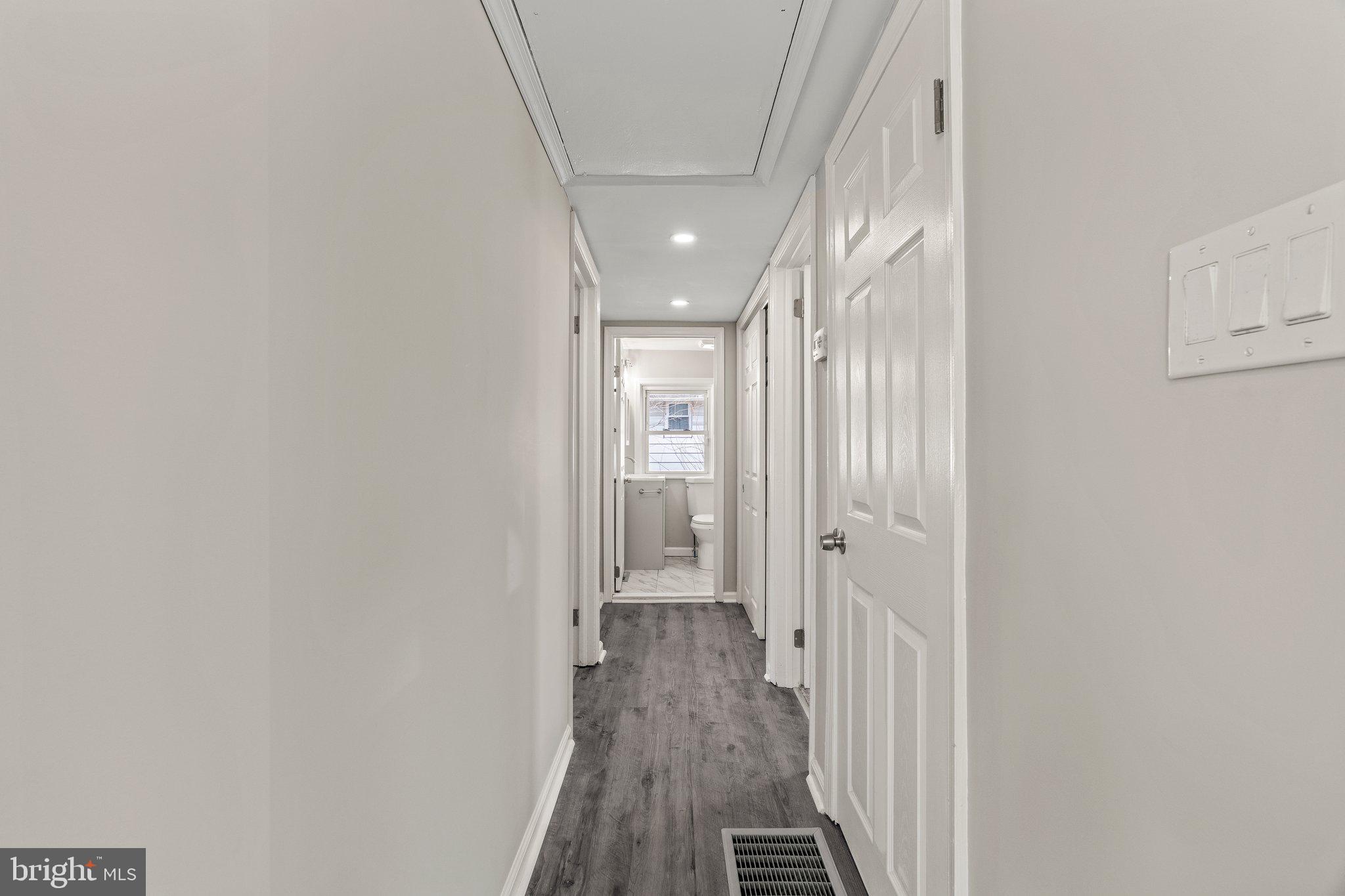 29 East 4th Street Burlington, NJ 08016 - Photo 13 of 27 a view of a hallway with wooden floor