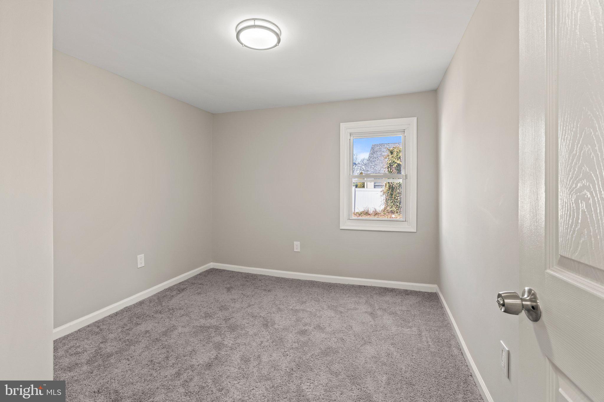 29 East 4th Street Burlington, NJ 08016 - Photo 14 of 27 an empty room with windows