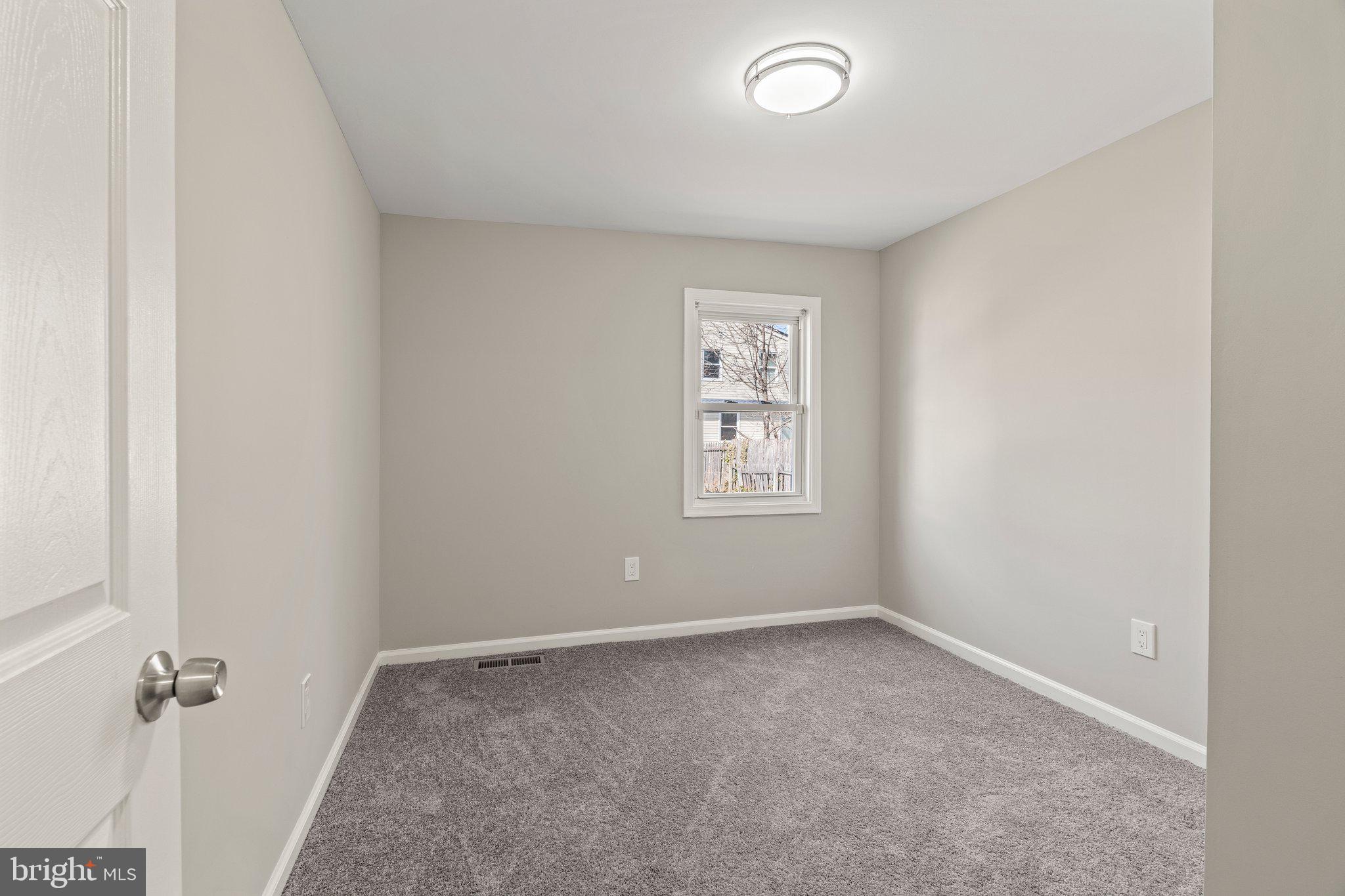 29 East 4th Street Burlington, NJ 08016 - Photo 16 of 27 an empty room with windows