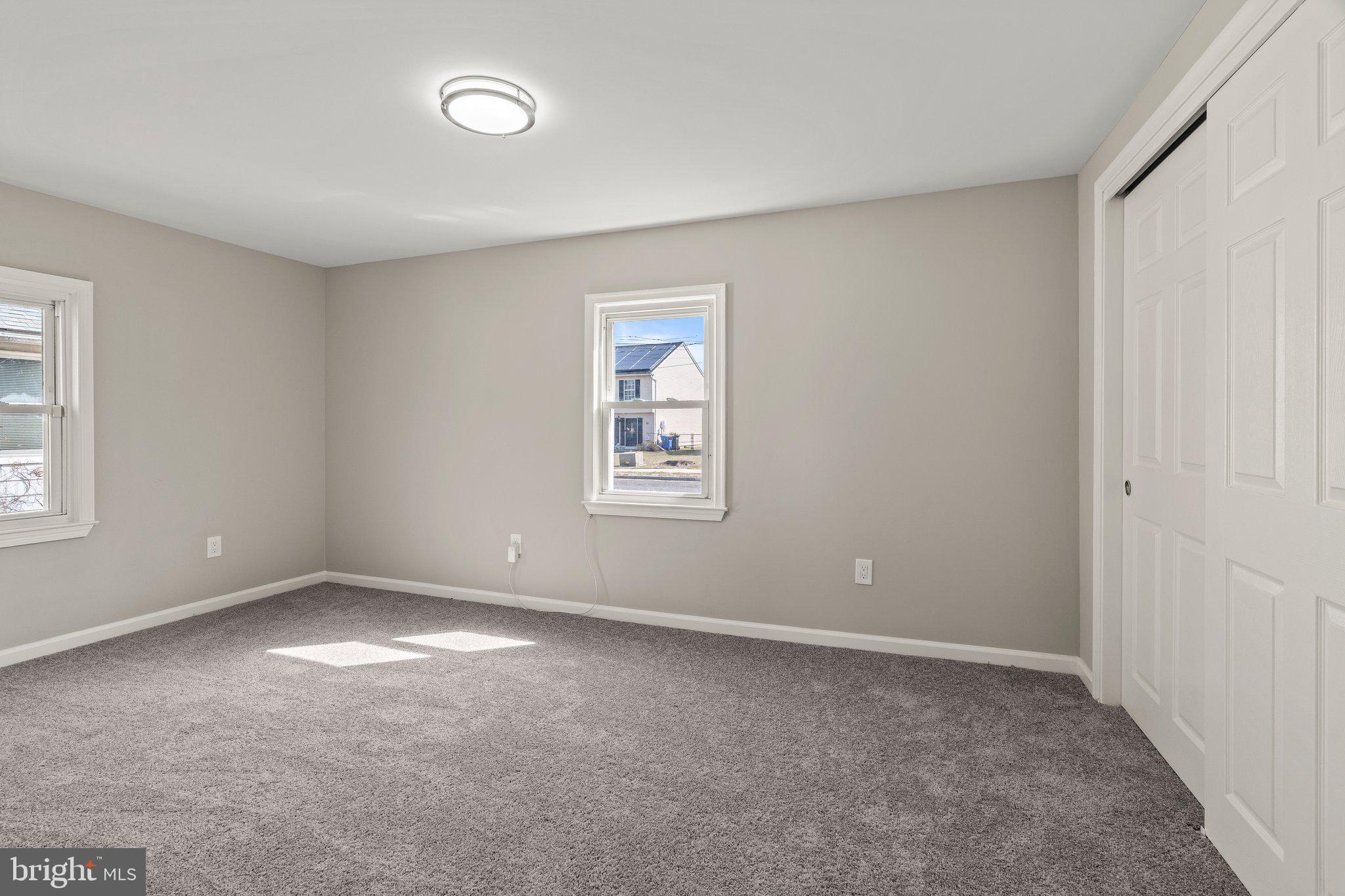 29 East 4th Street Burlington, NJ 08016 - Photo 18 of 27 a view of an empty room with a window