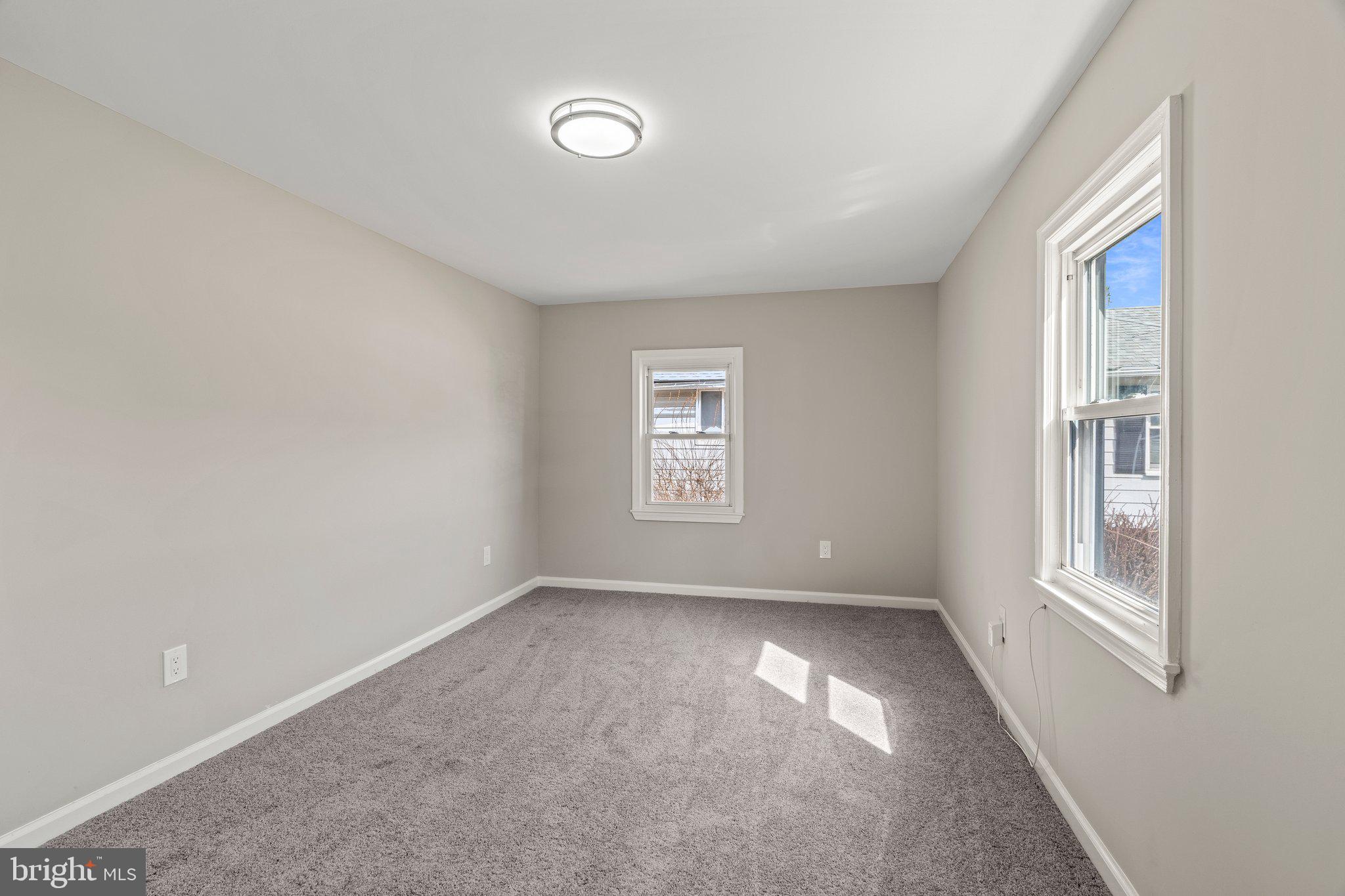 29 East 4th Street Burlington, NJ 08016 - Photo 19 of 27 an empty room with windows