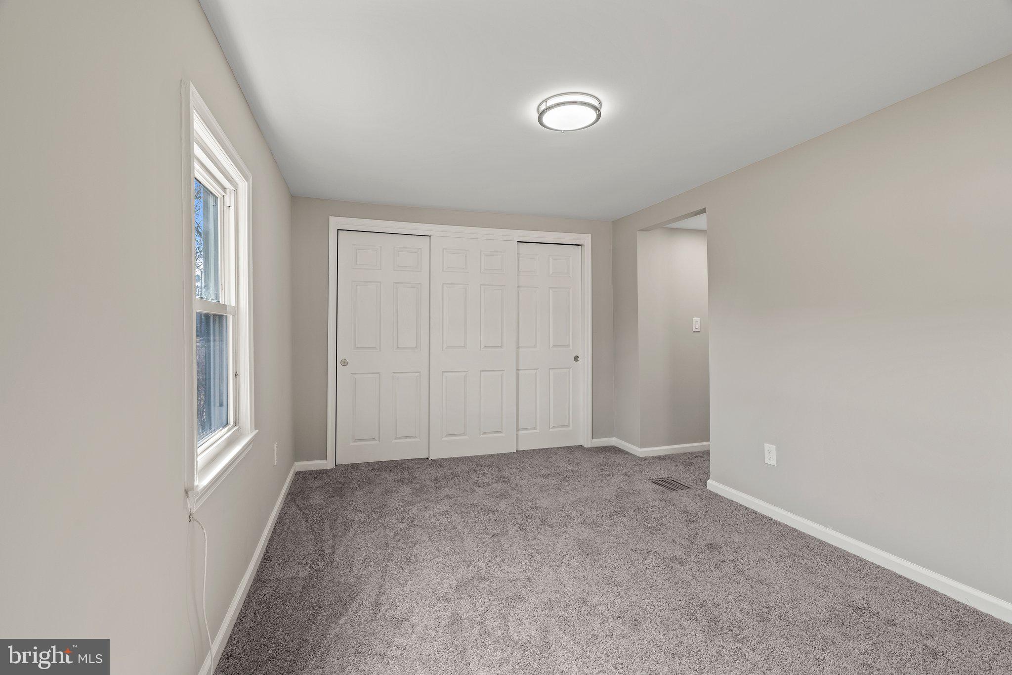 29 East 4th Street Burlington, NJ 08016 - Photo 20 of 27 a view of an empty room and window