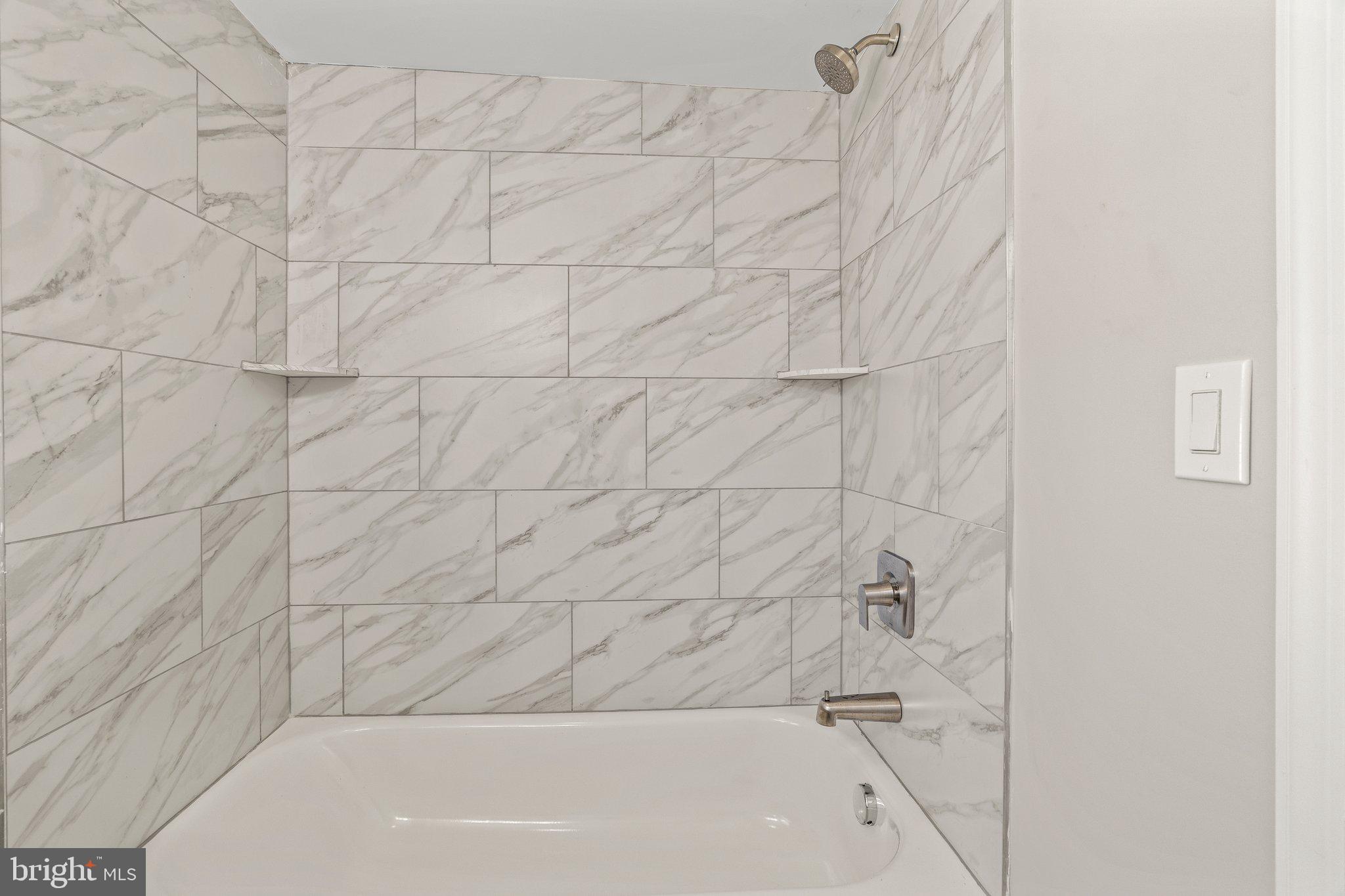 29 East 4th Street Burlington, NJ 08016 - Photo 22 of 27 a bathroom with a bathtub