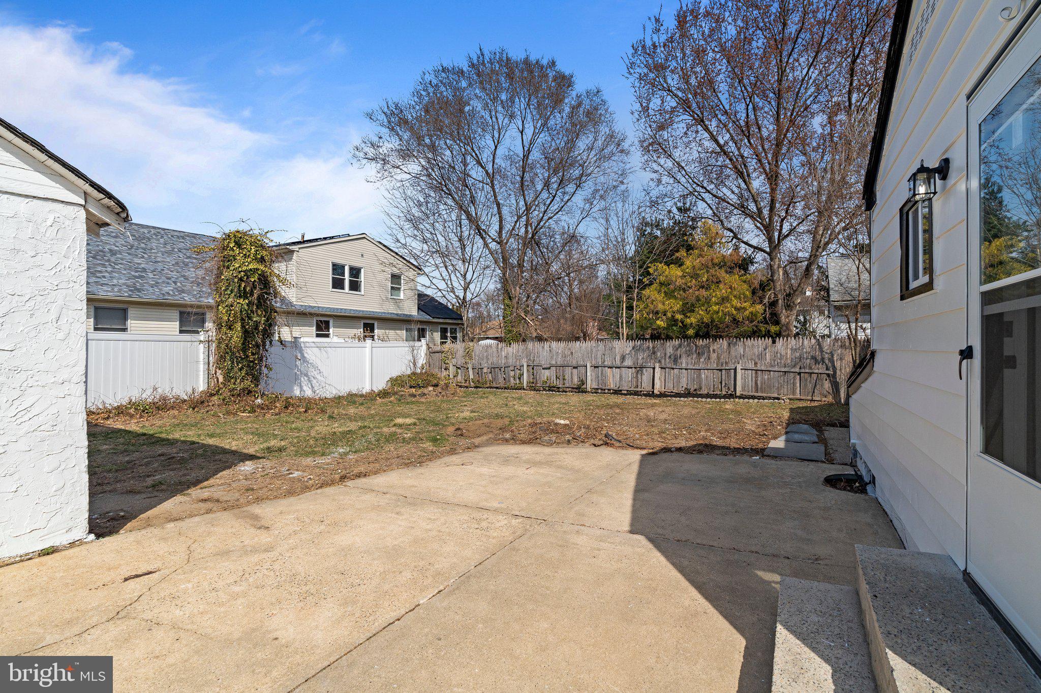 29 East 4th Street Burlington, NJ 08016 - Photo 25 of 27 a view of a white house with a yard