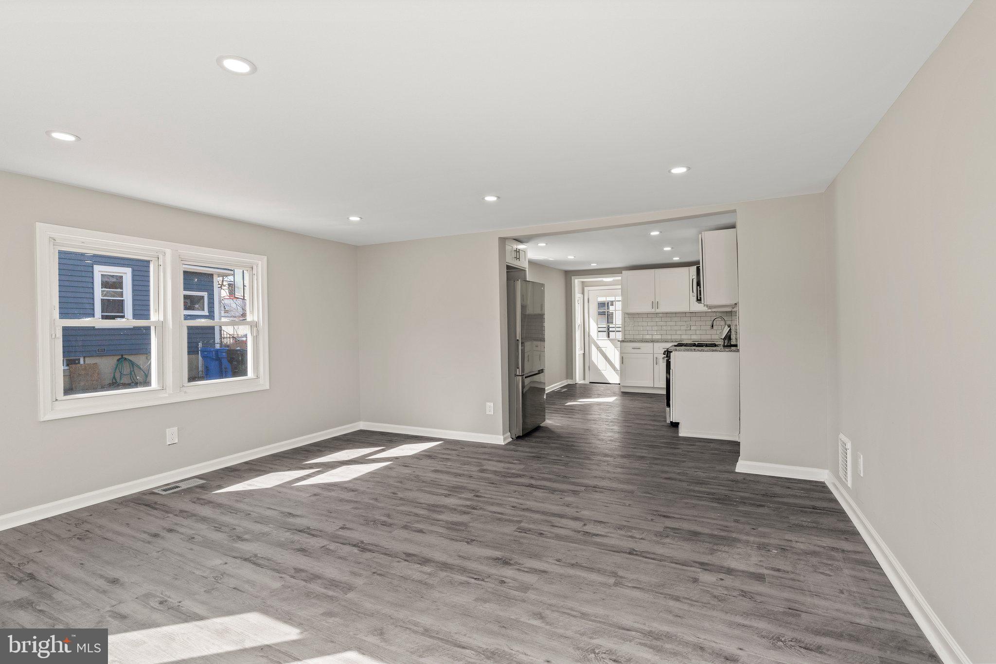 29 East 4th Street Burlington, NJ 08016 - Photo 5 of 27 a view of empty room with wooden floor and a window
