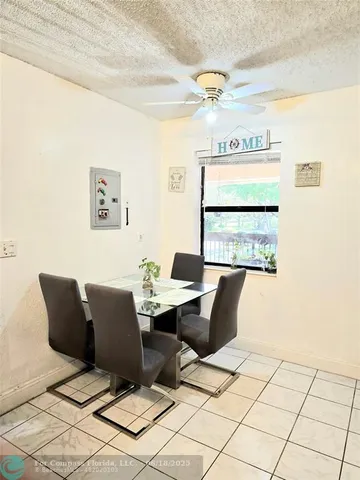 a view of workspace with wooden floor