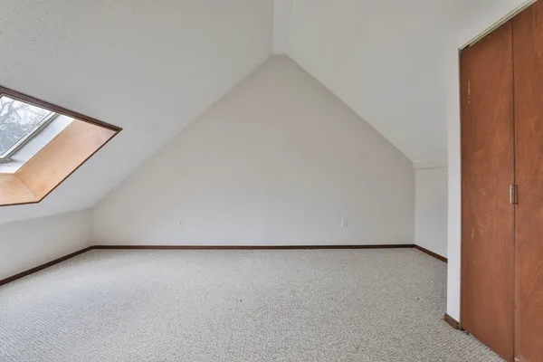 an empty room with a door