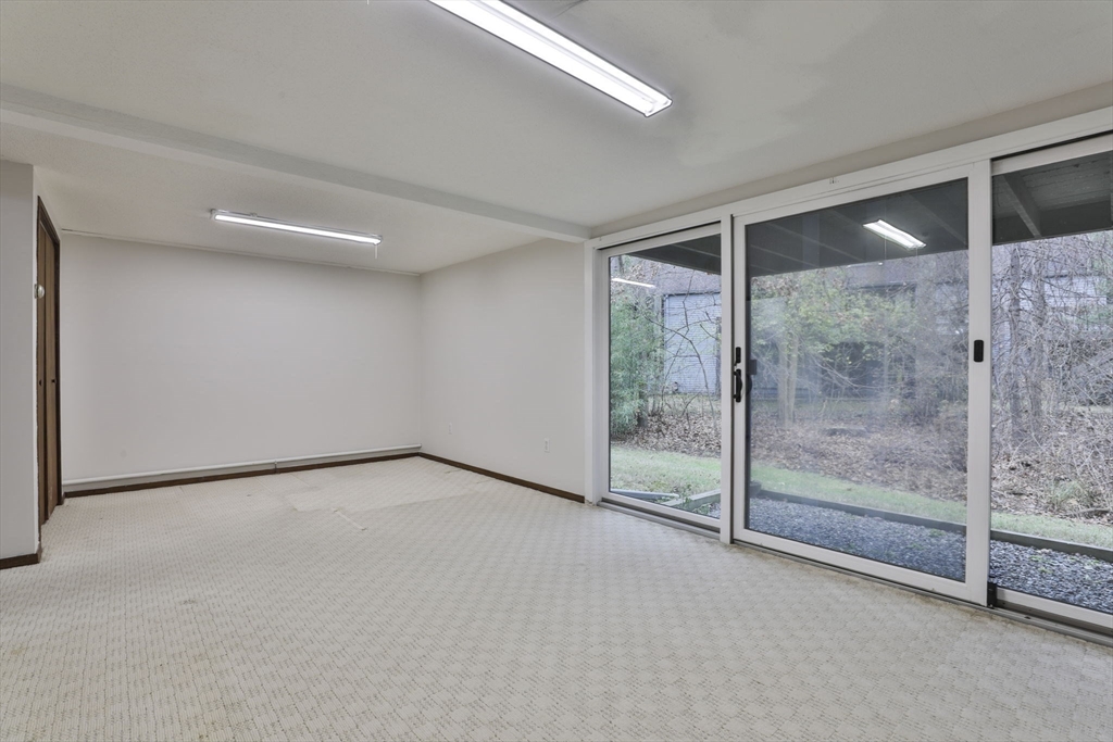 405 Great Elm Way, Unit 405 Acton, MA 01718 - Photo 19 of 19 a view of an empty room