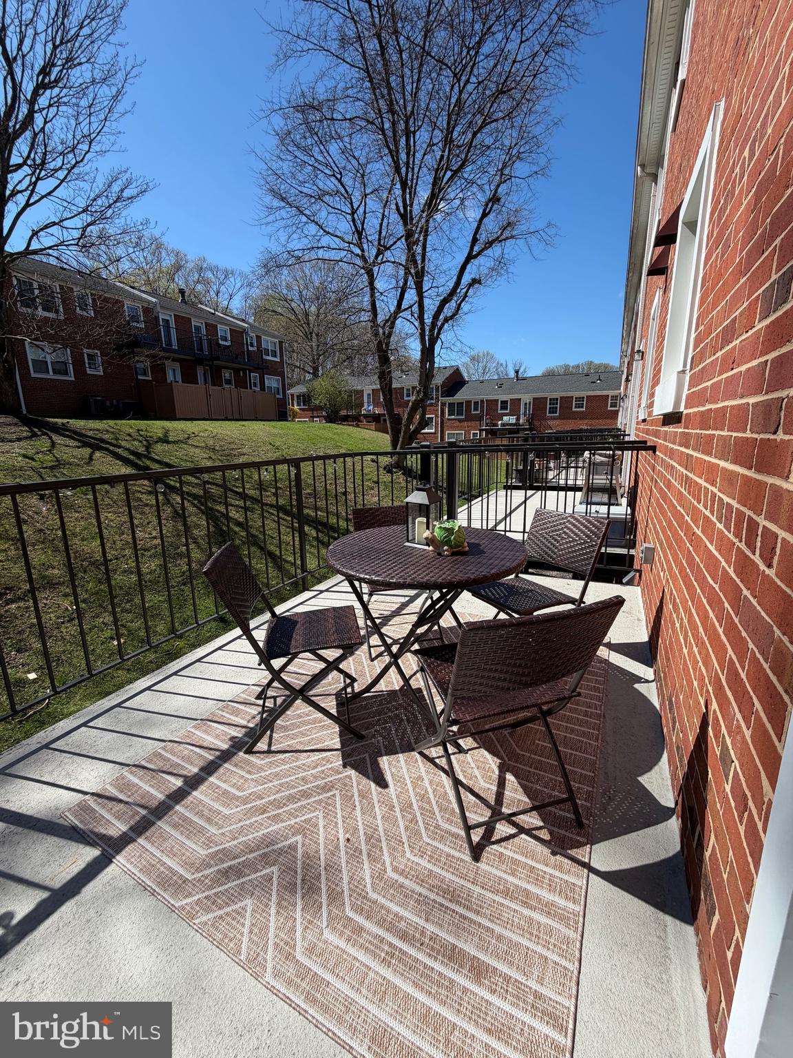 4614 28th Road South, Unit B Arlington, VA 22206 - Photo 18 of 19 a view of a chairs and table on the deck