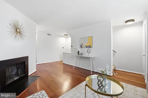 a room with furniture and a wooden floor