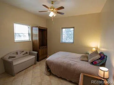 a bedroom with a bed and furniture