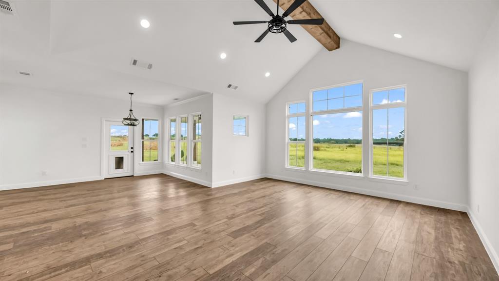 3451 Carraway Tbd County Road Paradise, TX 76073 - Photo 2 of 24 a view of an empty room with a window and wooden floor
