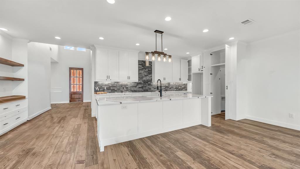 3451 Carraway Tbd County Road Paradise, TX 76073 - Photo 3 of 24 a large kitchen with a lot of counter space and a refrigerator