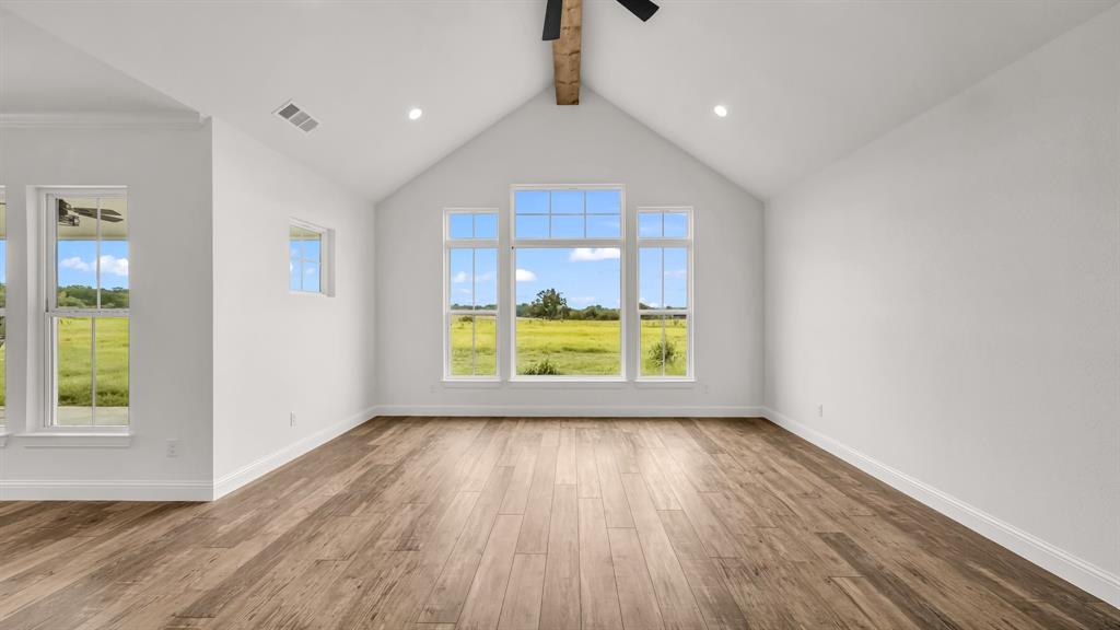 3451 Carraway Tbd County Road Paradise, TX 76073 - Photo 7 of 24 a view of an empty room with a window and wooden floor