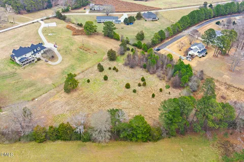 a view of swimming pool with a yard