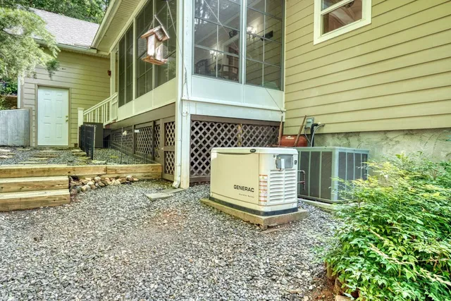 an aerial view of a houses with city view and lake view