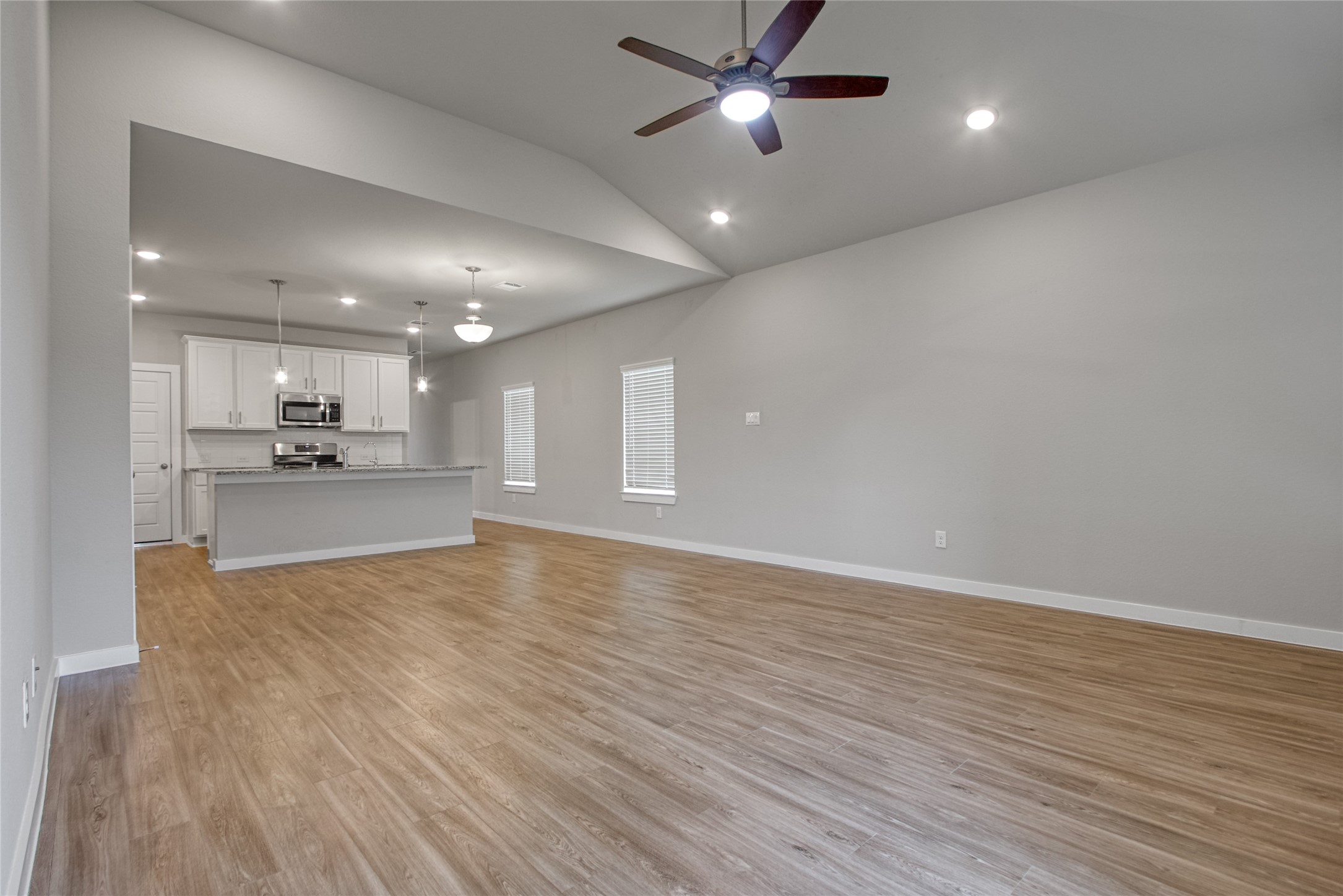 3327 Trl Vw Drive Rosenberg, TX 77471 - Photo 12 of 30 a view of large kitchen with a sink and microwave