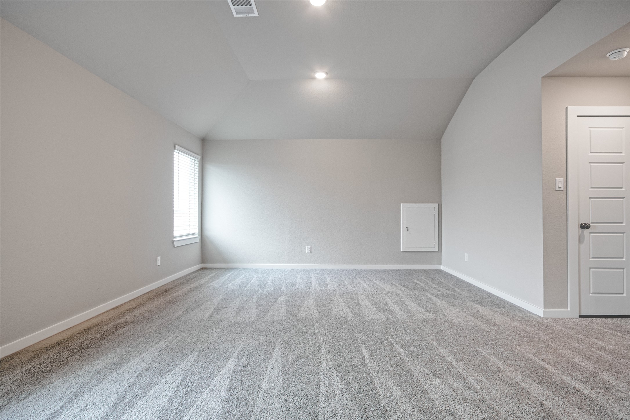 3327 Trl Vw Drive Rosenberg, TX 77471 - Photo 20 of 30 wooden floor in an empty room with a window