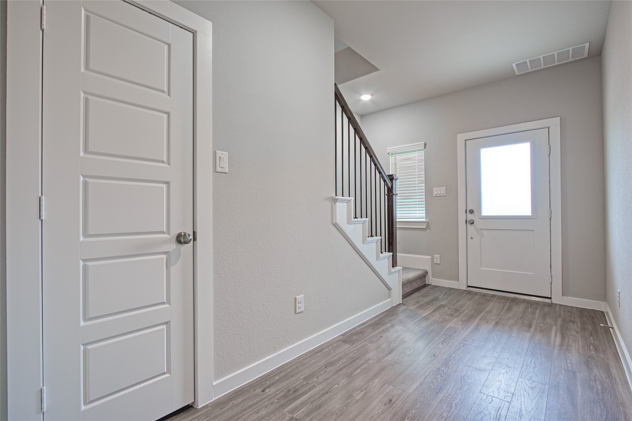 3327 Trl Vw Drive Rosenberg, TX 77471 - Photo 3 of 30 a view of entryway with wooden floor