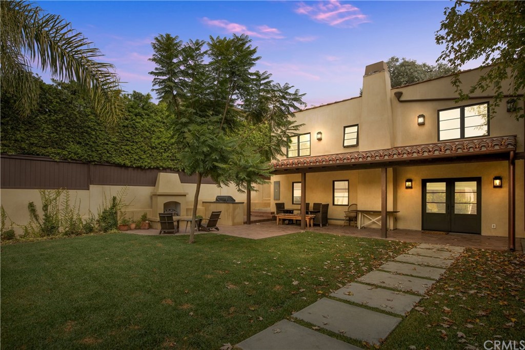 351 Whiting Street El Segundo, CA 90245 - Photo 2 of 60 a front view of a house with a yard