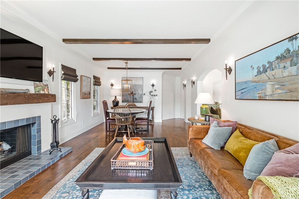 351 Whiting Street El Segundo, CA 90245 - Photo 12 of 60 a living room with furniture a flat screen tv and a fireplace
