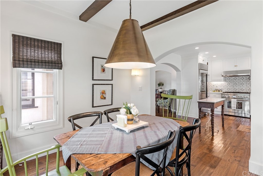 351 Whiting Street El Segundo, CA 90245 - Photo 18 of 60 a view of a dining room with furniture window and wooden floor