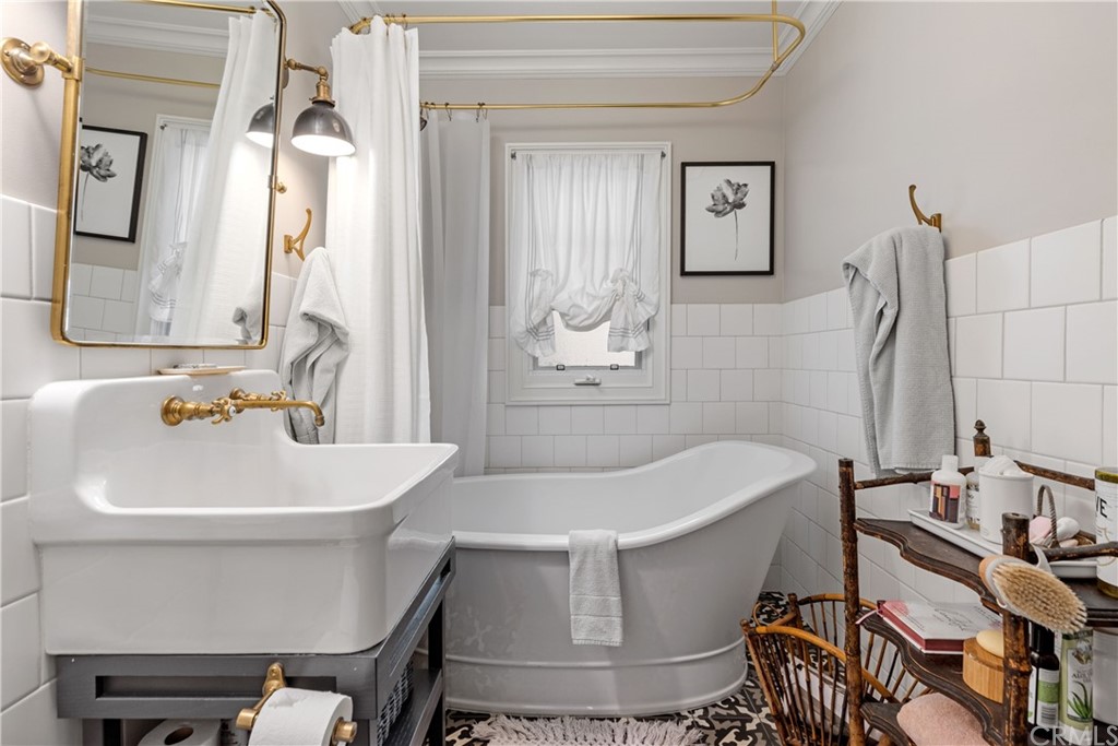 351 Whiting Street El Segundo, CA 90245 - Photo 25 of 60 a bathroom with a sink and a mirror