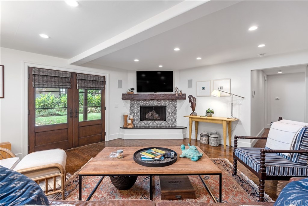 351 Whiting Street El Segundo, CA 90245 - Photo 28 of 60 a living room with furniture and a fireplace