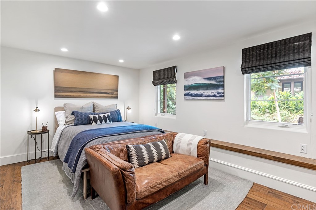 351 Whiting Street El Segundo, CA 90245 - Photo 31 of 60 a bedroom with a bed and a large window