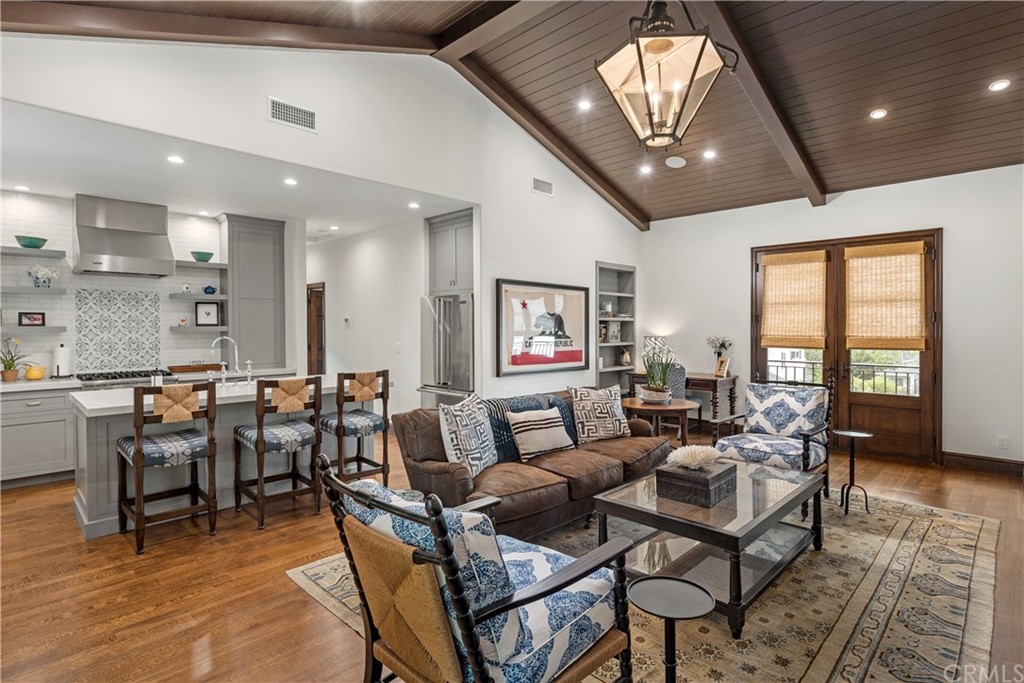 351 Whiting Street El Segundo, CA 90245 - Photo 50 of 60 a living room with lots of furniture and a large window