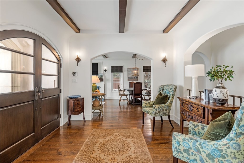 351 Whiting Street El Segundo, CA 90245 - Photo 7 of 60 a living room with furniture a dining table and chairs with wooden floor
