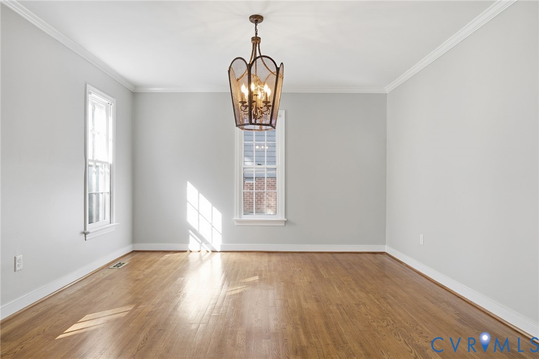 12918 Ashtree Road Midlothian, VA 23114 - Photo 14 of 43 a view of empty room with wooden floor and fan