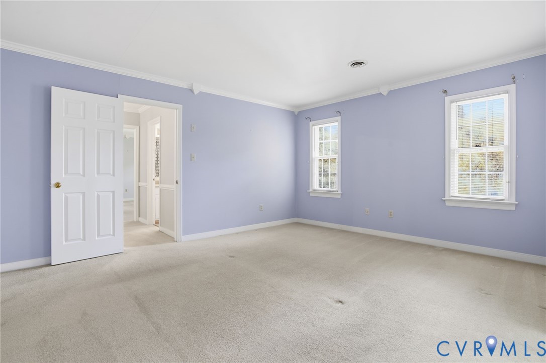 12918 Ashtree Road Midlothian, VA 23114 - Photo 17 of 43 a view of an empty room with a window
