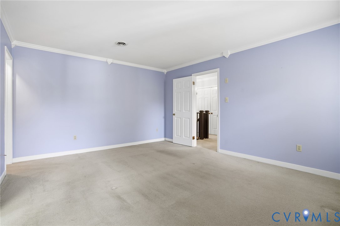 12918 Ashtree Road Midlothian, VA 23114 - Photo 18 of 43 a view of an empty room with closet and a window