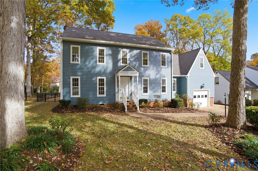 12918 Ashtree Road Midlothian, VA 23114 - Photo 2 of 43 a front view of a house with patio