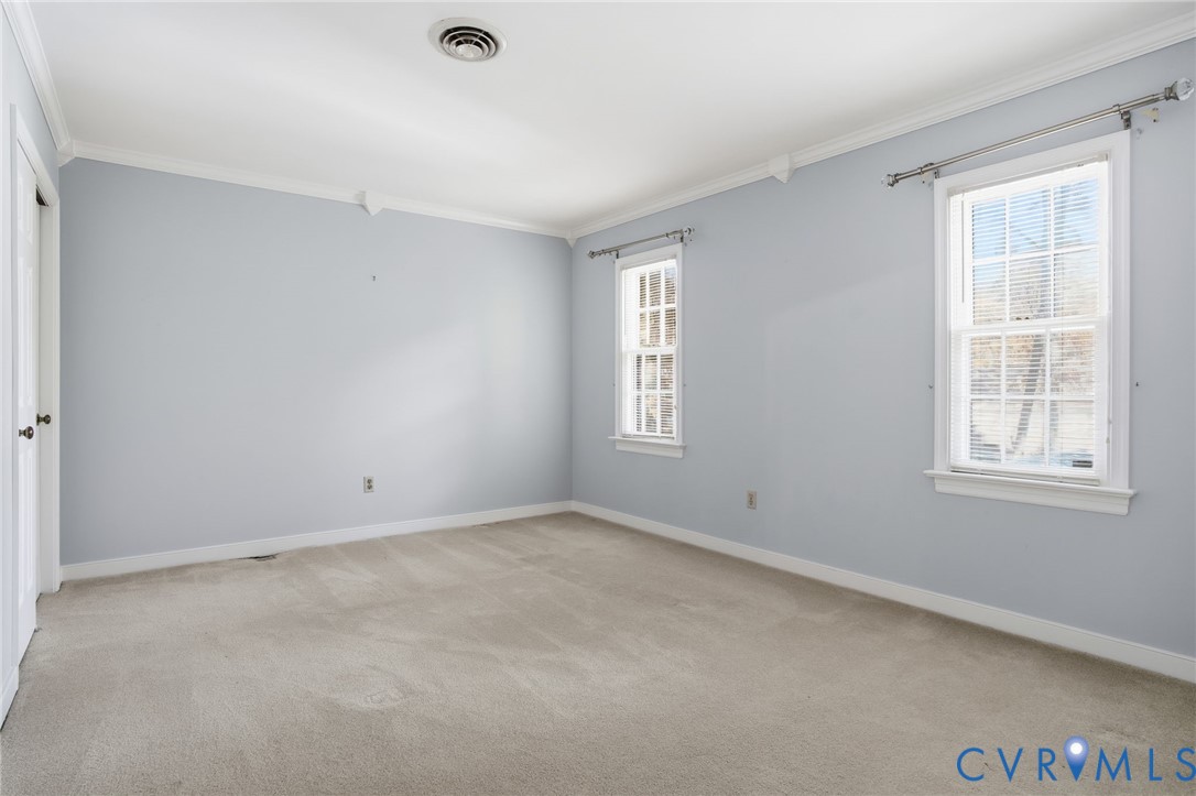 12918 Ashtree Road Midlothian, VA 23114 - Photo 23 of 43 an empty room with windows