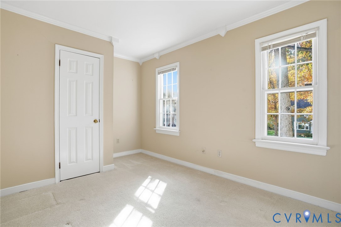 12918 Ashtree Road Midlothian, VA 23114 - Photo 25 of 43 an empty room with windows