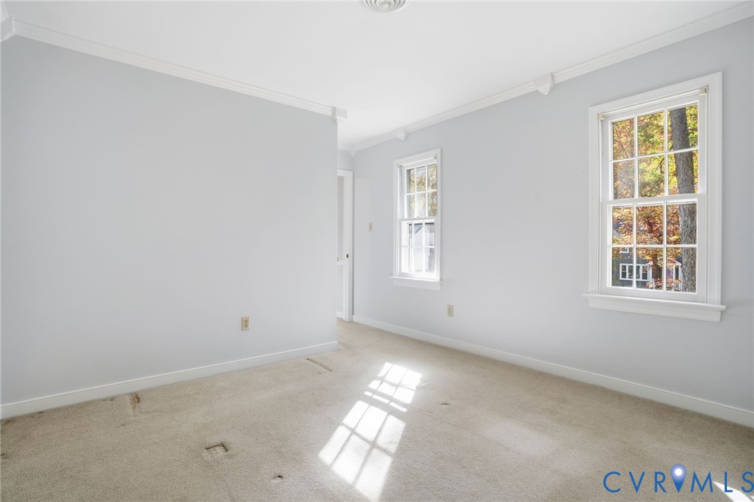 12918 Ashtree Road Midlothian, VA 23114 - Photo 26 of 43 an empty room with windows