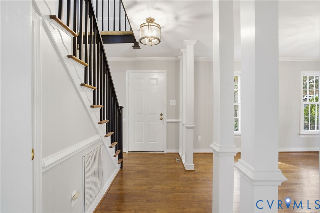 12918 Ashtree Road Midlothian, VA 23114 - Photo 4 of 43 a view of an entryway with wooden floor