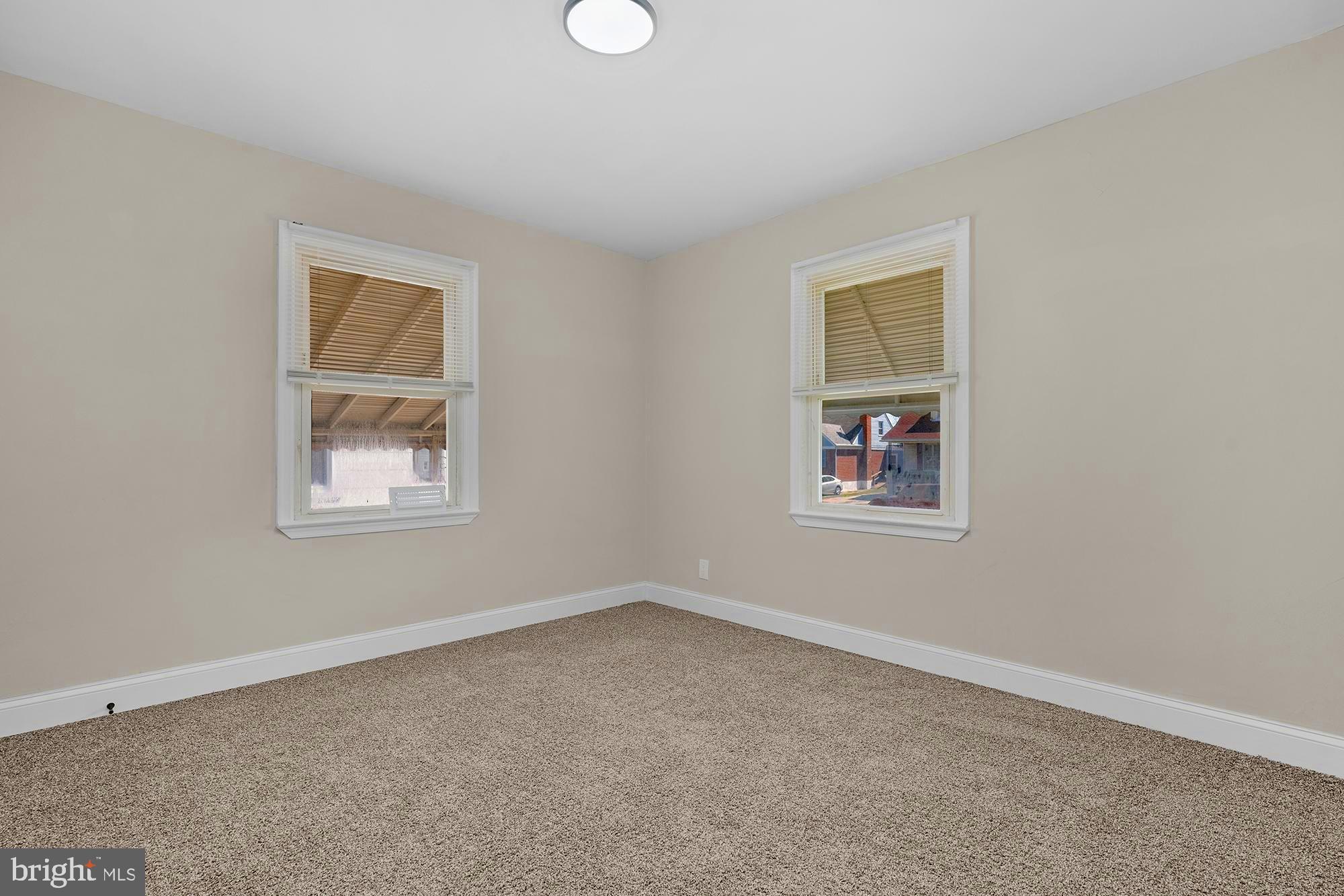 3708 West Cold Spring Lane Baltimore, MD 21215 - Photo 19 of 33 an empty room with a window