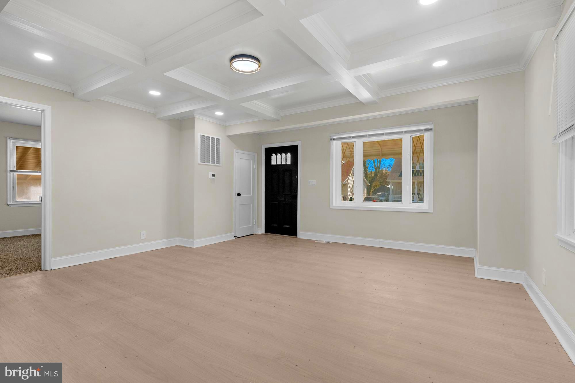 3708 West Cold Spring Lane Baltimore, MD 21215 - Photo 5 of 33 an empty room with windows and closet