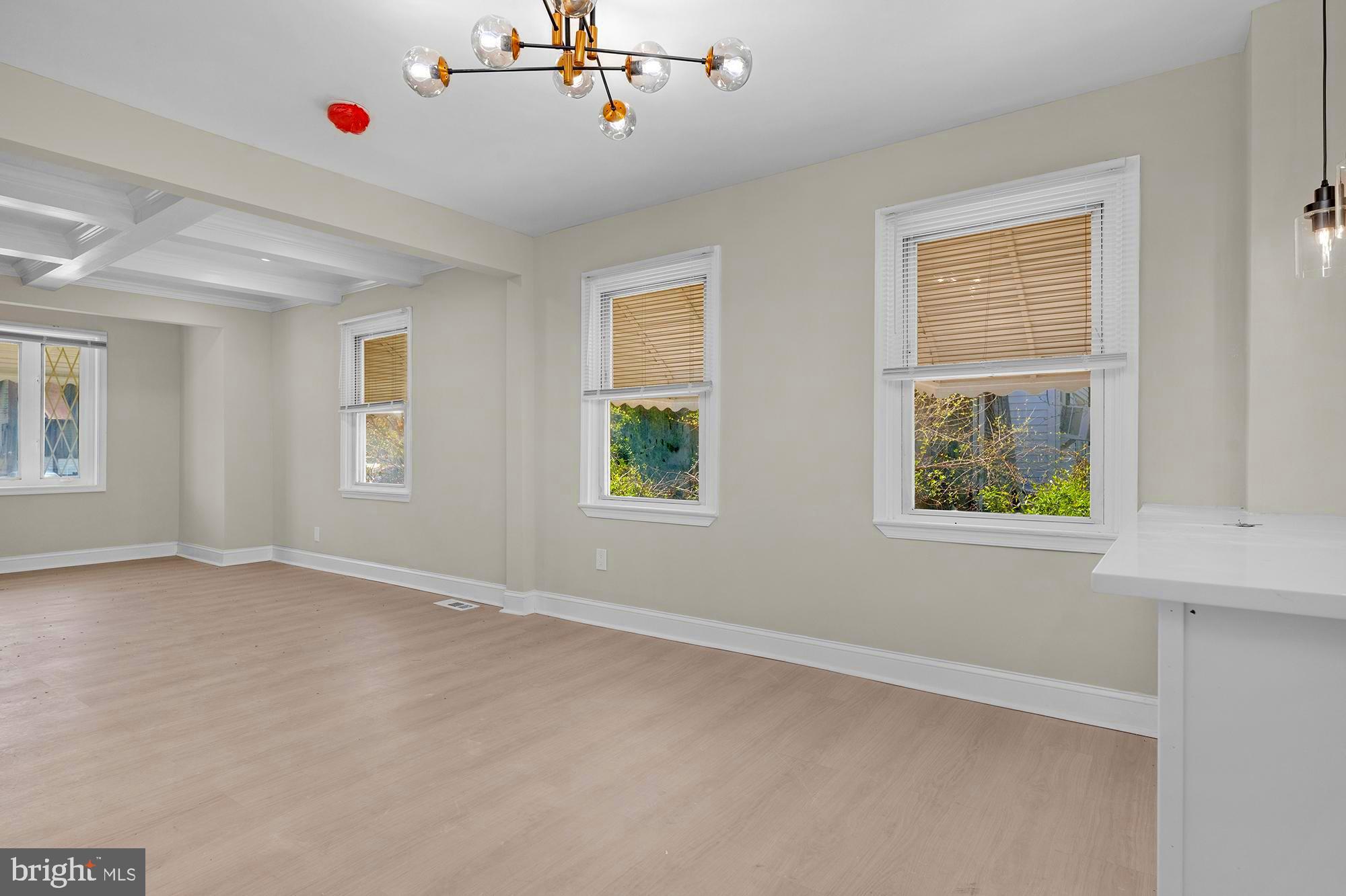 3708 West Cold Spring Lane Baltimore, MD 21215 - Photo 8 of 33 a window and a ceiling fan in a room