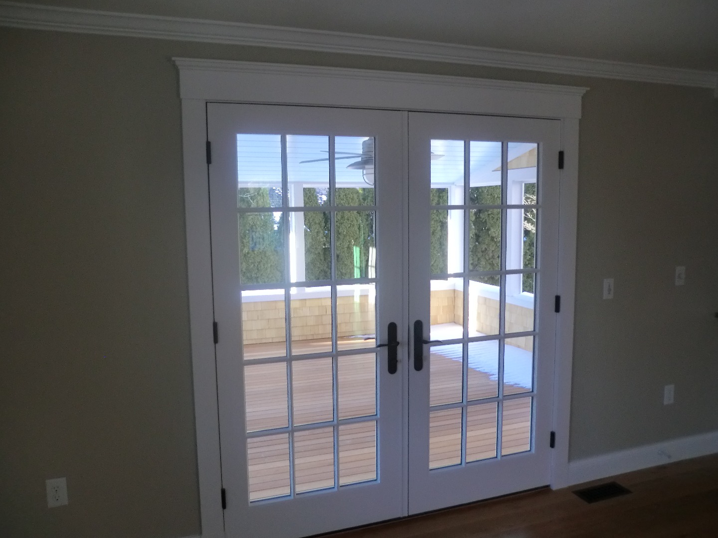 114 South Summer Street Edgartown, MA 02539 - Photo 19 of 102 a view of empty room with wooden floor and windows