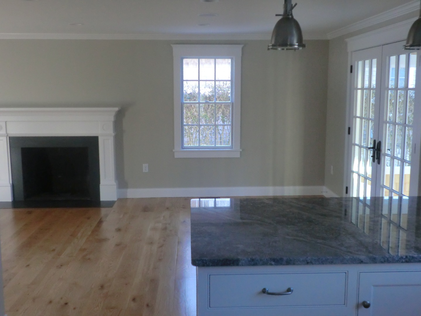114 South Summer Street Edgartown, MA 02539 - Photo 27 of 102 a view of an empty room with wooden floor and a window