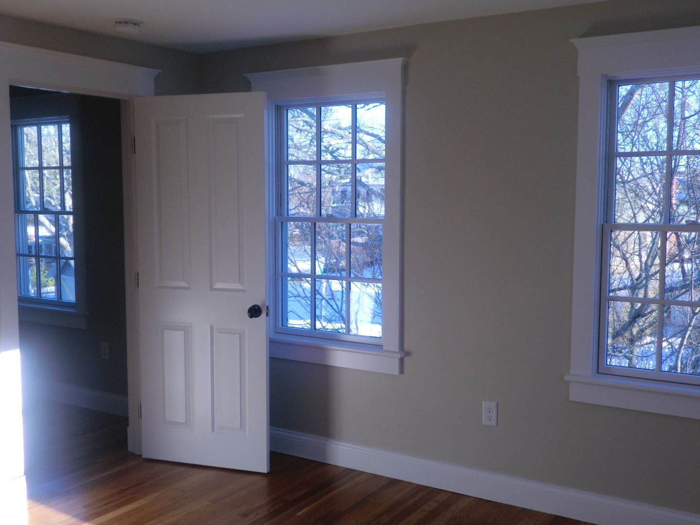 114 South Summer Street Edgartown, MA 02539 - Photo 36 of 102 a view of an empty room with wooden floor and a window