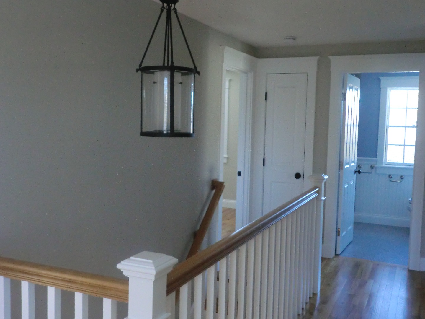 114 South Summer Street Edgartown, MA 02539 - Photo 39 of 102 a view of a hallway view with wooden floor and staircase