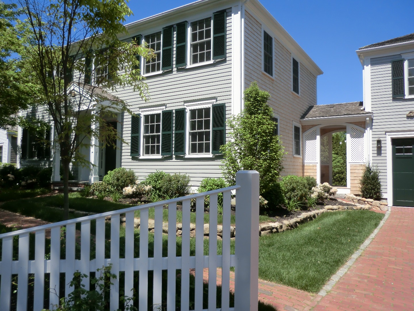 114 South Summer Street Edgartown, MA 02539 - Photo 4 of 102 a front view of house with yard and green space